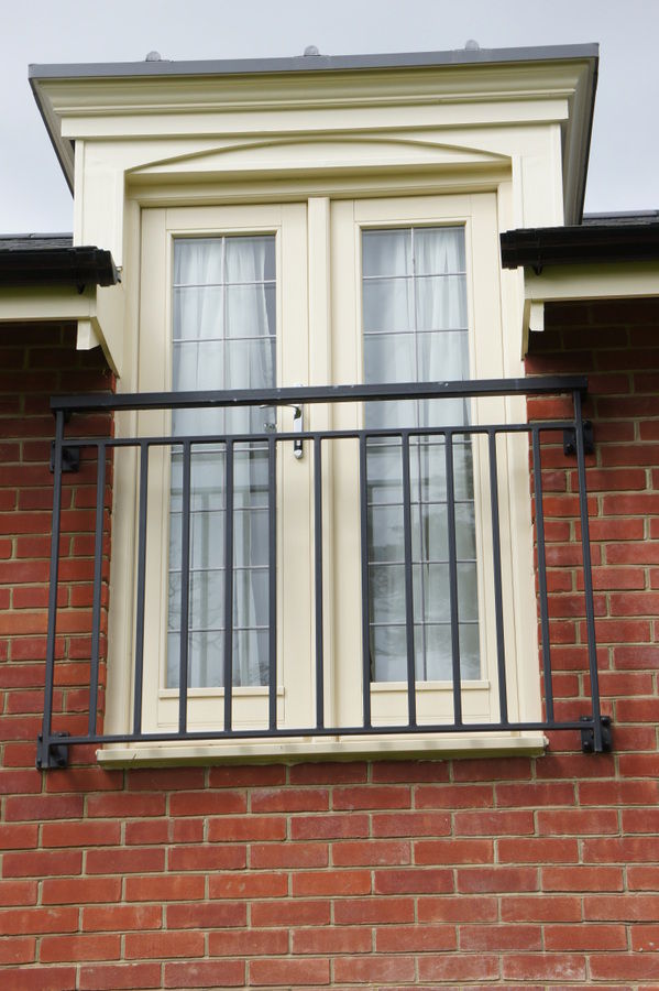 Black metal Juliet balcony on a dormer window
