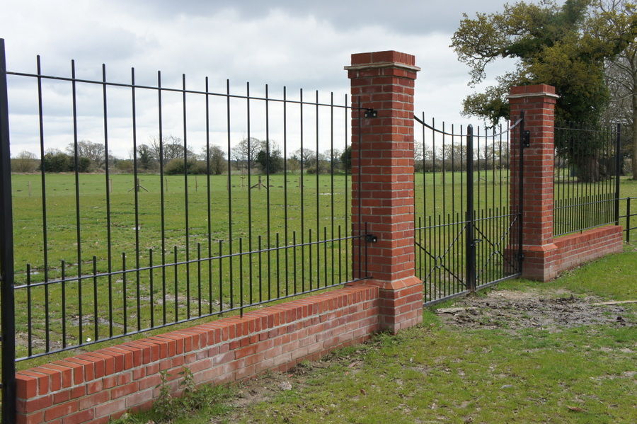 Metal entrance gates installed by Heritage Gates & Railings